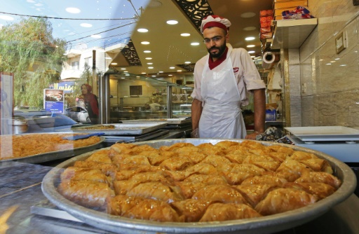 Réfugié en Jordanie, un pâtissier syrien vend les douceurs de son pays