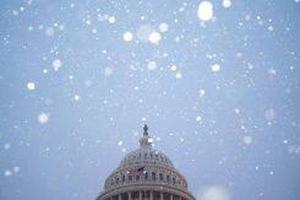 <p/>Le dôme du Capitole de Washington sous la neige, le 16 janvier 2022